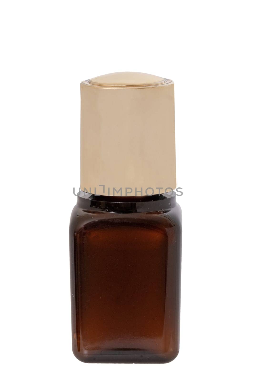 Cosmetic serum isolated. Close-uo of a brown glass bottle with a beige cap filled with beauty serum for face isolated on a white background. Concept beauty. Macro photograph.