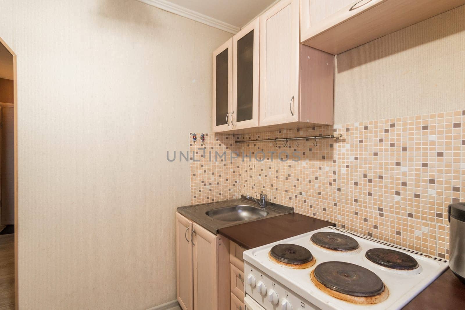 Russia, Moscow- July 02, 2019: interior room apartment. standard repair decoration in hostel. modern kitchen, dining area
