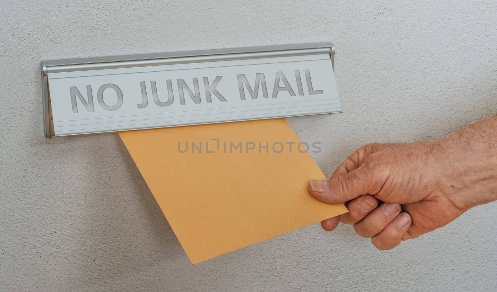 A letterbox with the inscription No junk mail