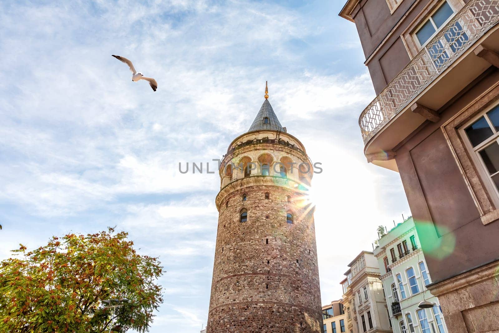 Galata Tower in the autumn sun, Istanbul, Turkey.