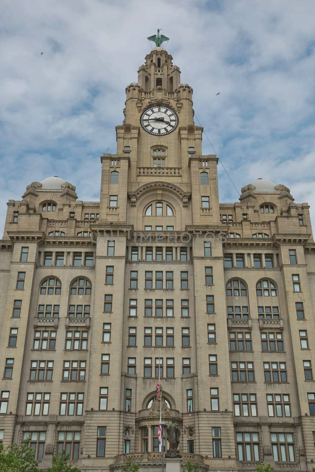 Liverpool's Historic Liver Building and Clocktower, Liverpool, England, United Kingdom. Liverpool, in North West England, is a major city and metropolitan borough with population of 478,580 in 2015.