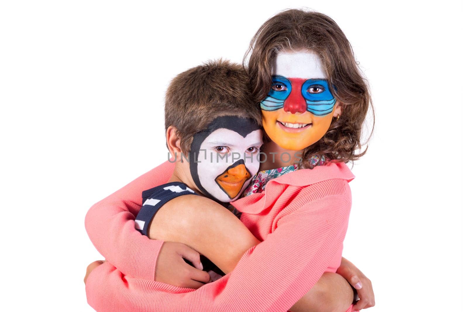Children's couple with animal face-paint isolated in white