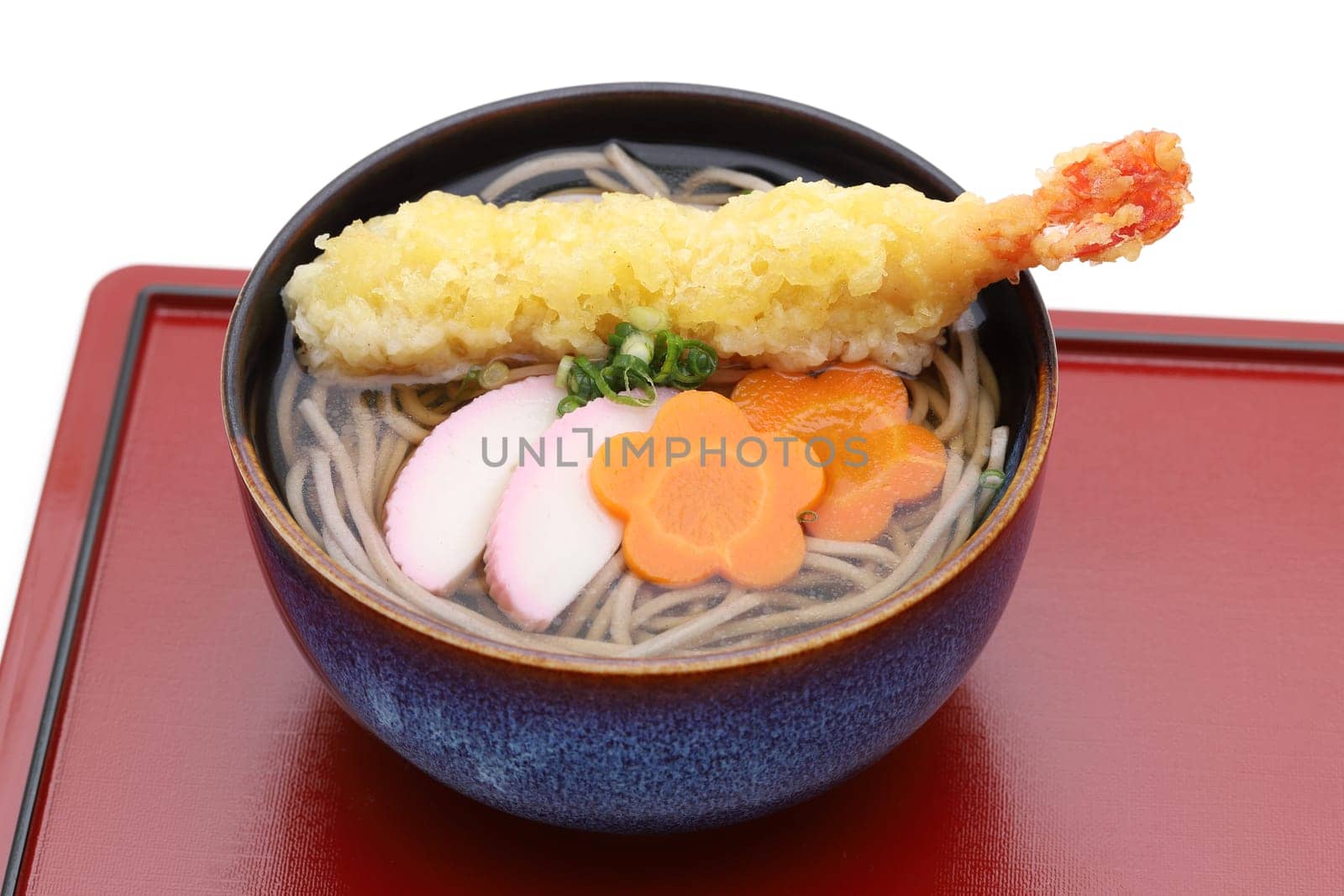 Japanese Tenpura soba noodles in a bowl on white background