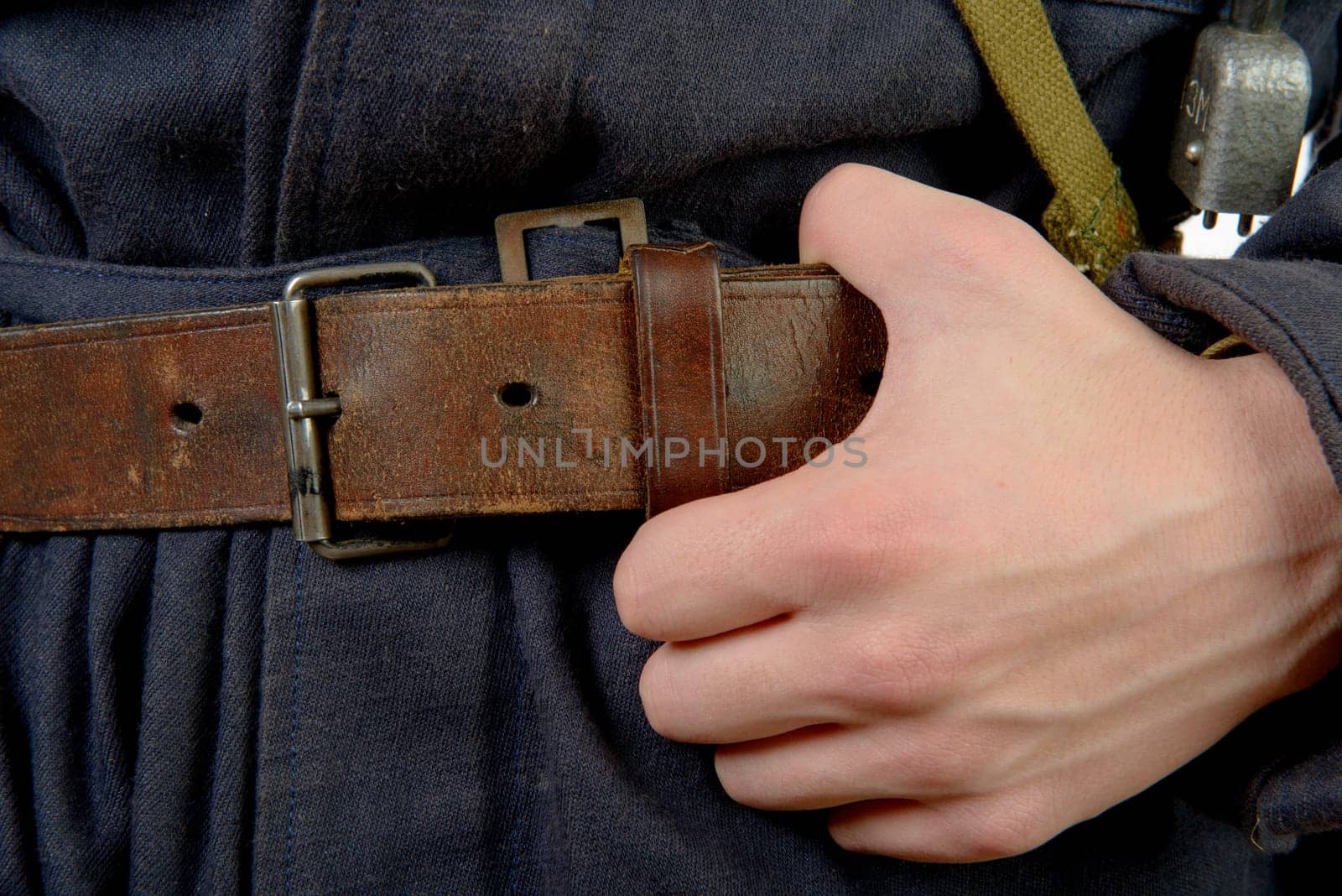 closeup on the vintage belt of a worker