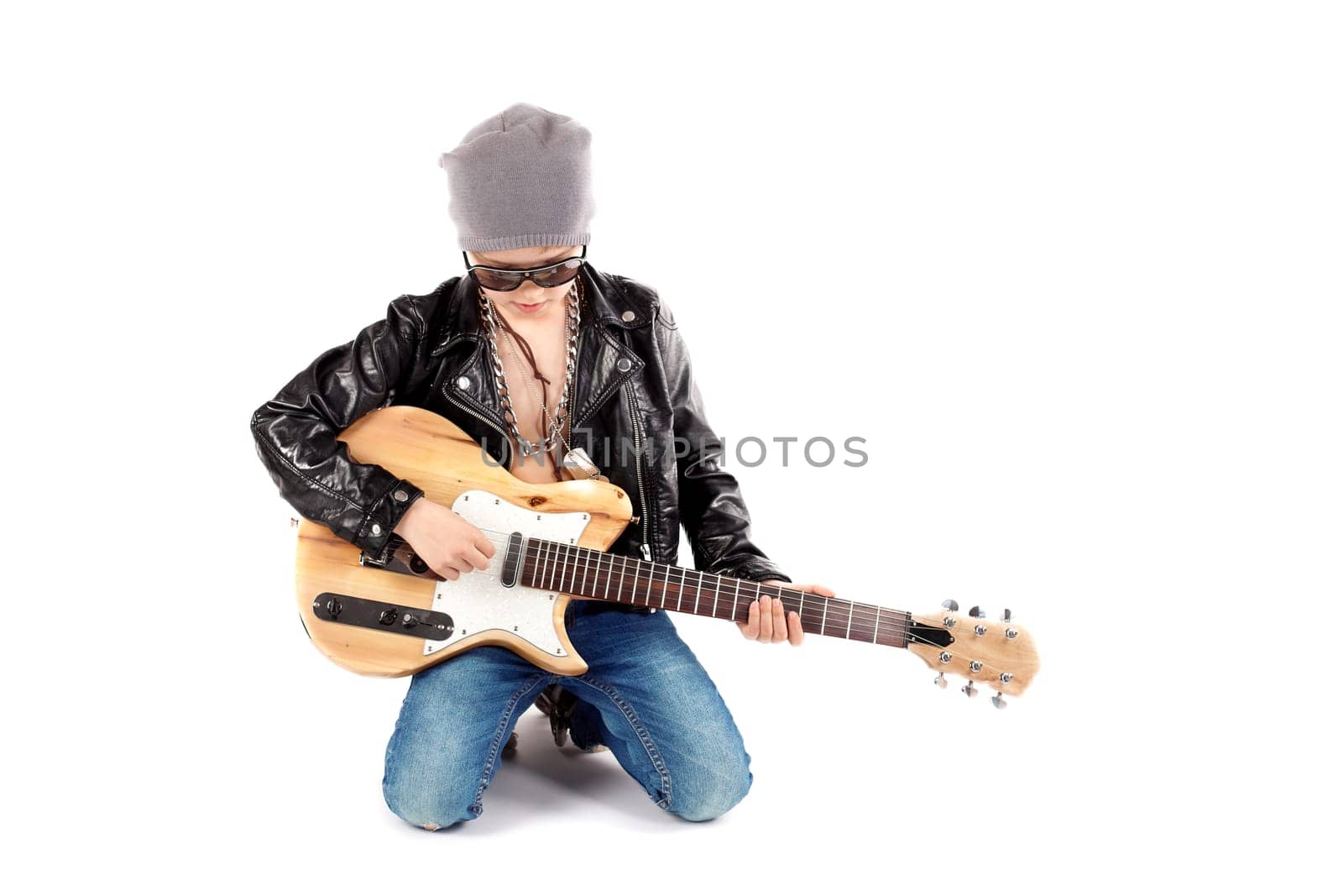 Boy with guitar - isolated
