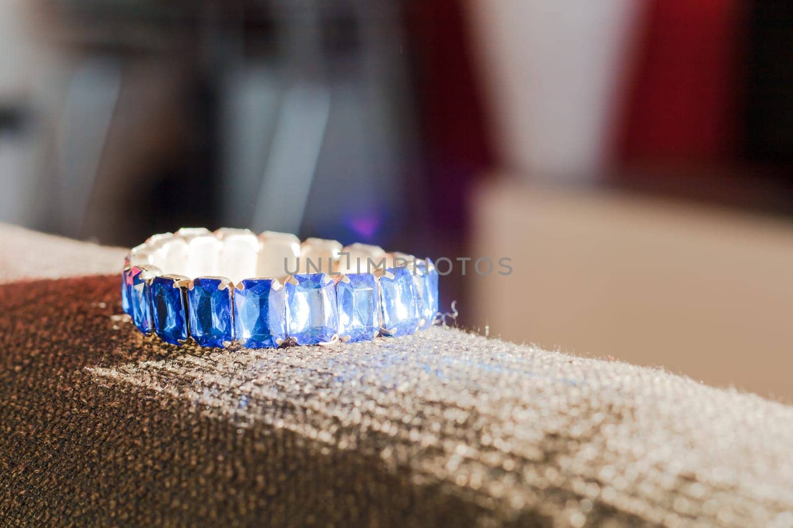 Blue jewel on the sun Lying on my sofa.
