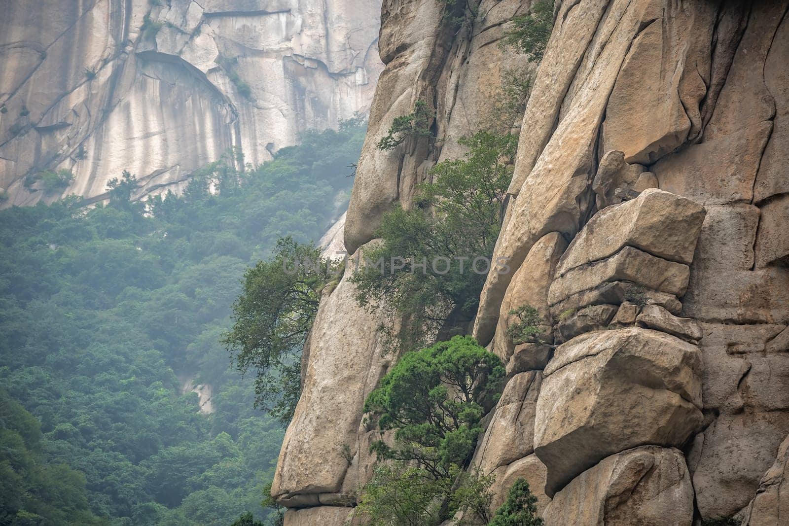 Close up of the rocky hillside of the inspiring, sacred and majestic Huashan mountain, famous tourist attractions, Shaanxi province, China