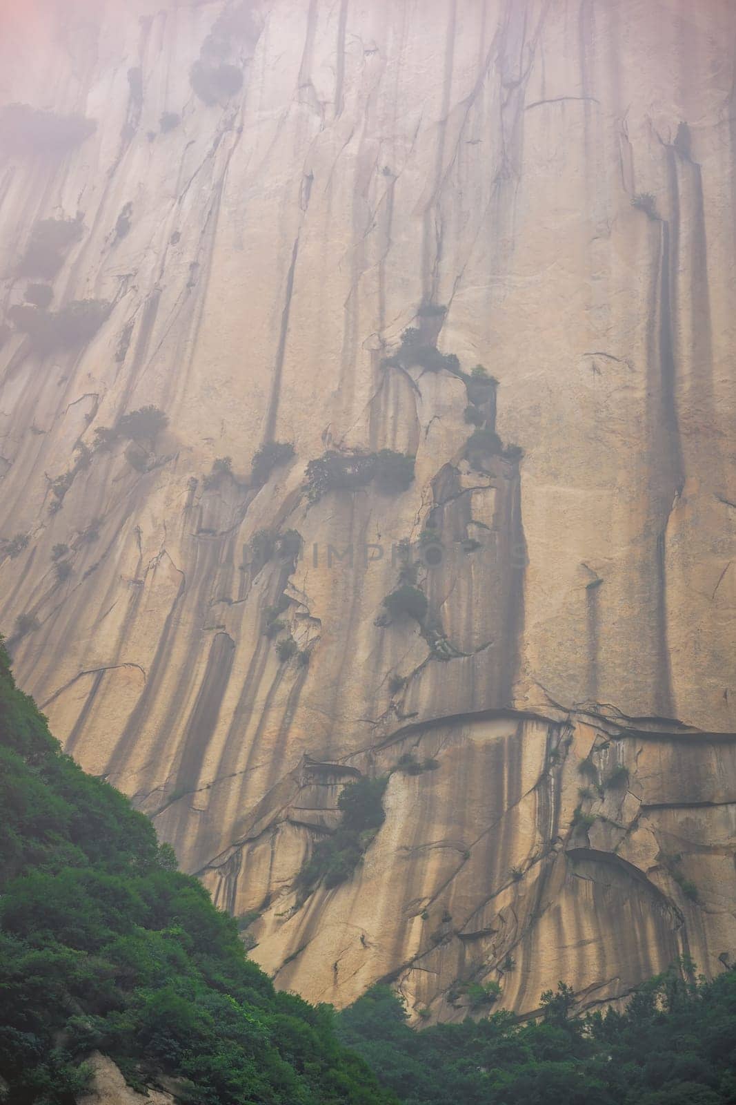 Close up of the rocky hillside of the inspiring, sacred and majestic Huashan mountain, famous tourist attractions, Shaanxi province, China
