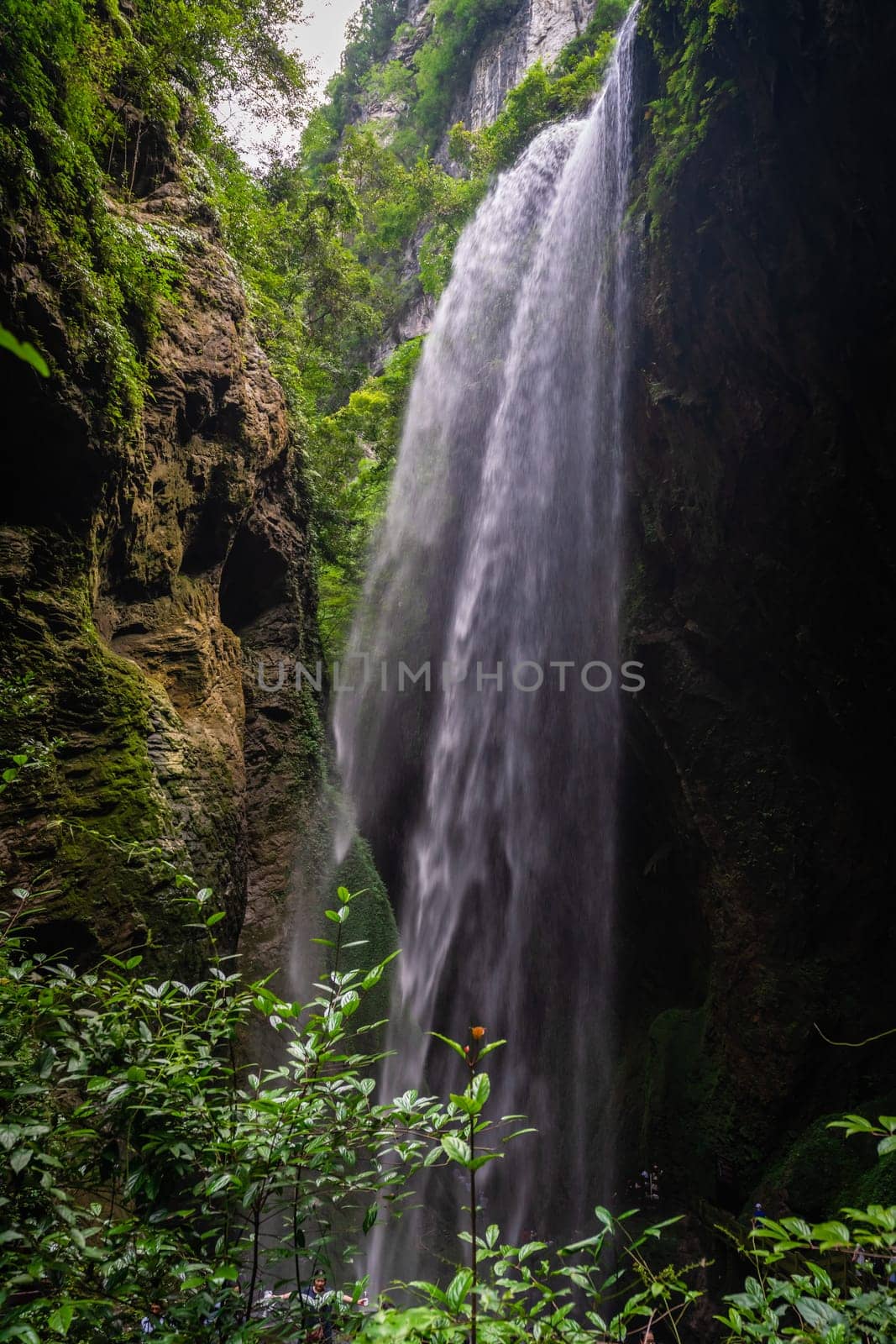 Giant Waterfall in a valley gorge in the Longshuixia Fissure National park, Wulong country, Chongqing, China