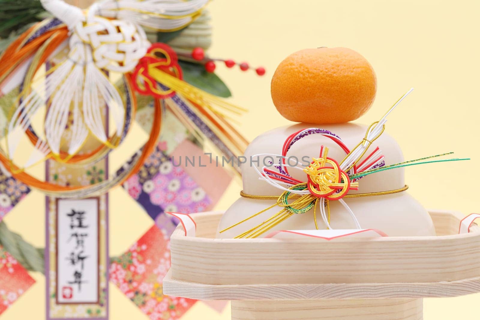 Japanese new year decoration Kagamimochi, Japanese word of this photography means "happy new year"""