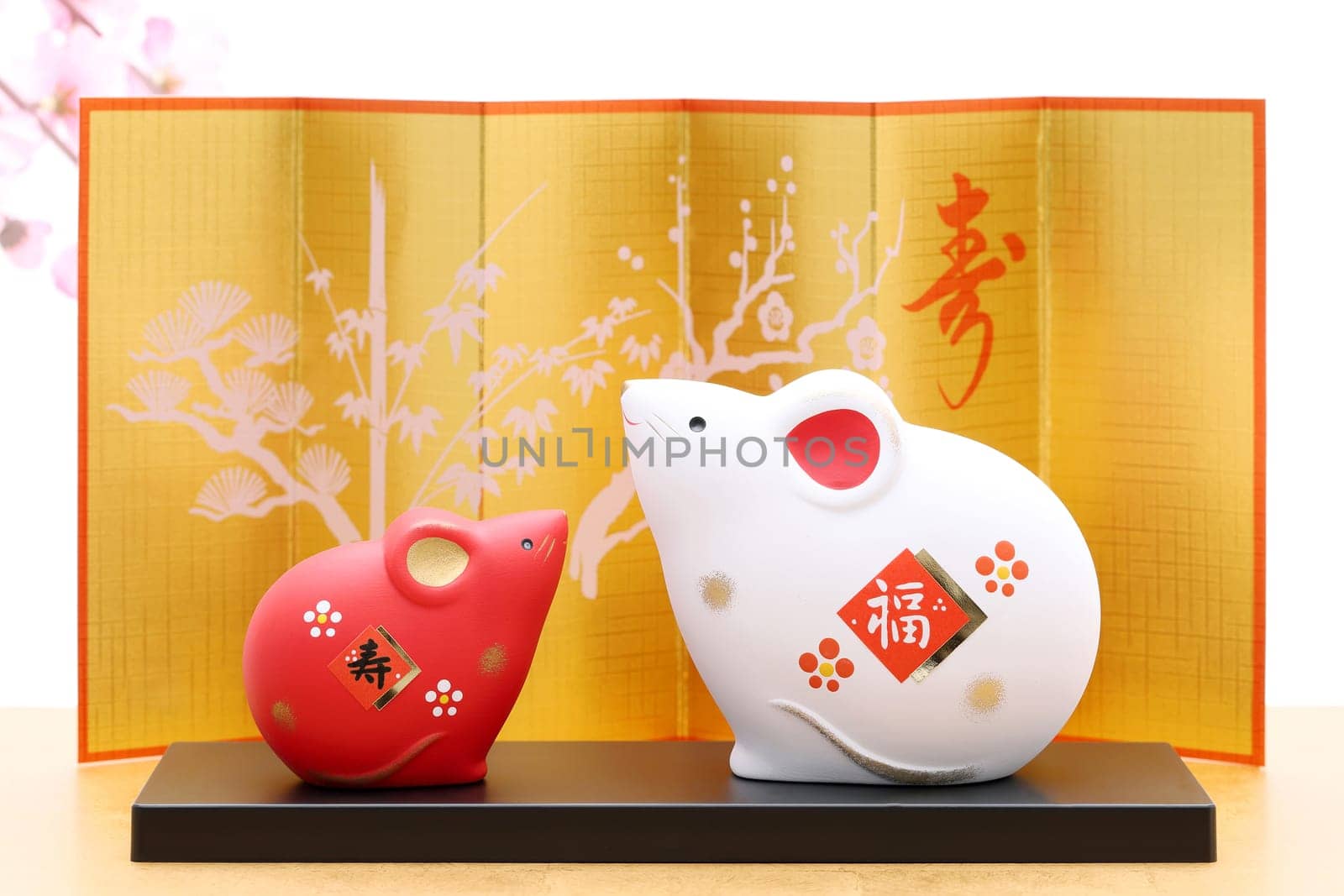 Dolls of Nezumi Mouse. Japanese new year card. Japanese new year Mouse object. Japanese word of this photography means "celebration or congraturations"""