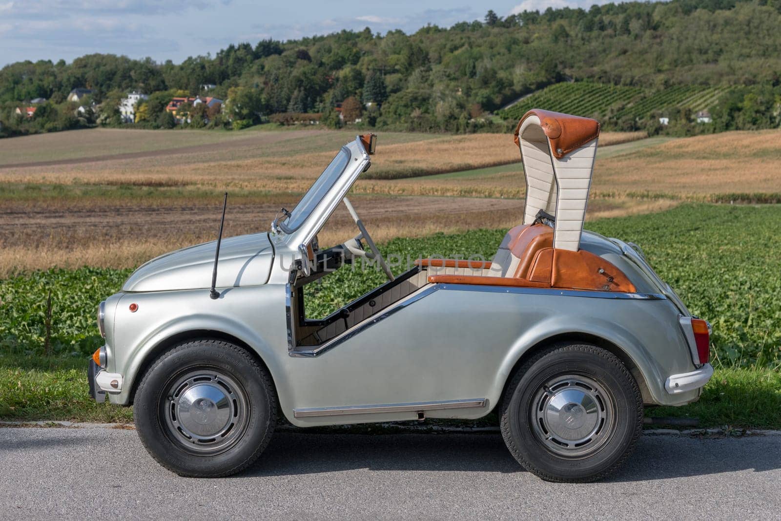 Oldtimer Puch 500D,modified Sacher,year of construction 1974,2 cylinders,displacement 493 ccm,hp 16,110 km/h,side view left