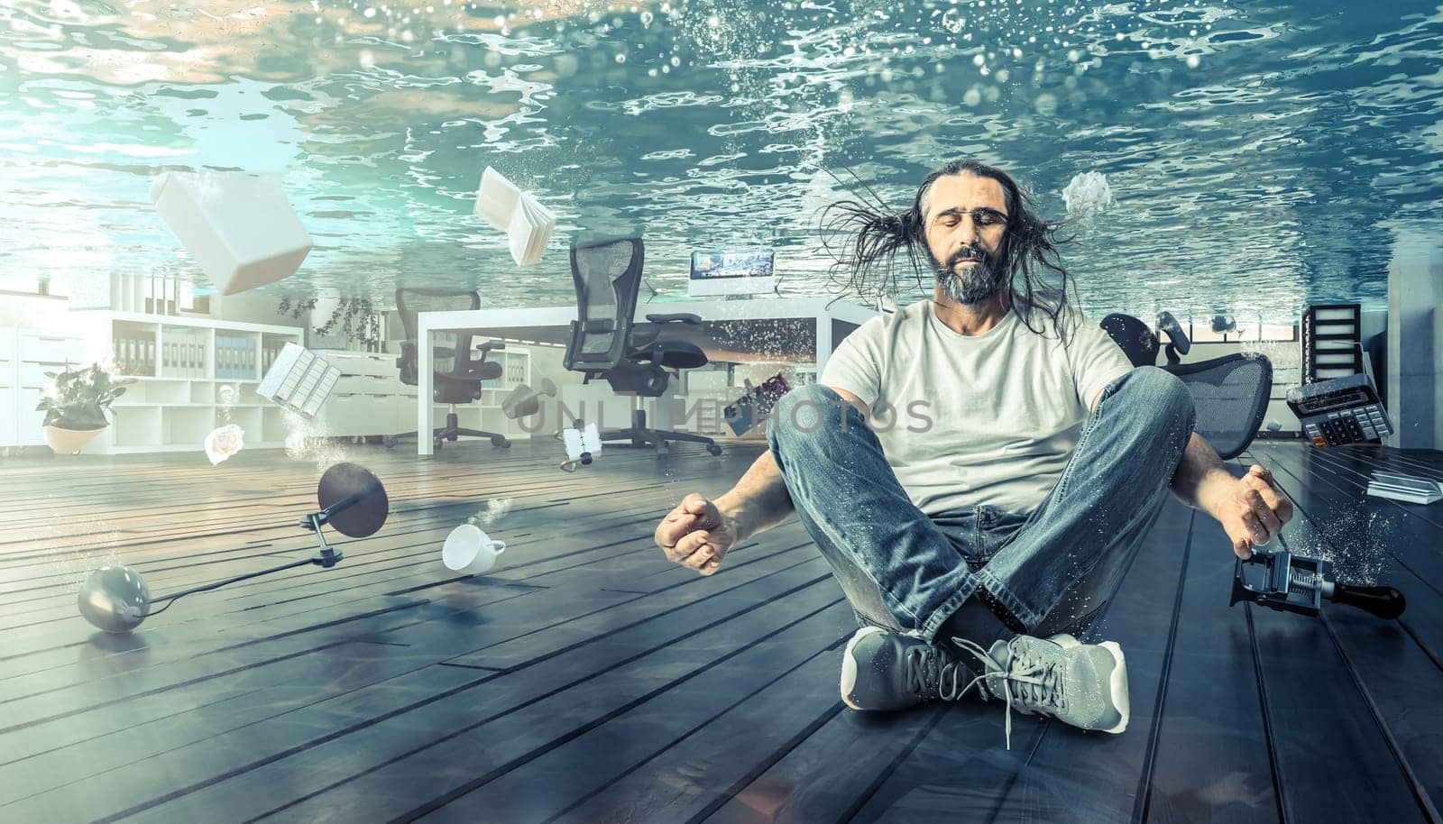 man sitting underwater who relaxes in a yoga position. Office completely flooded. Concept of problems and calm.