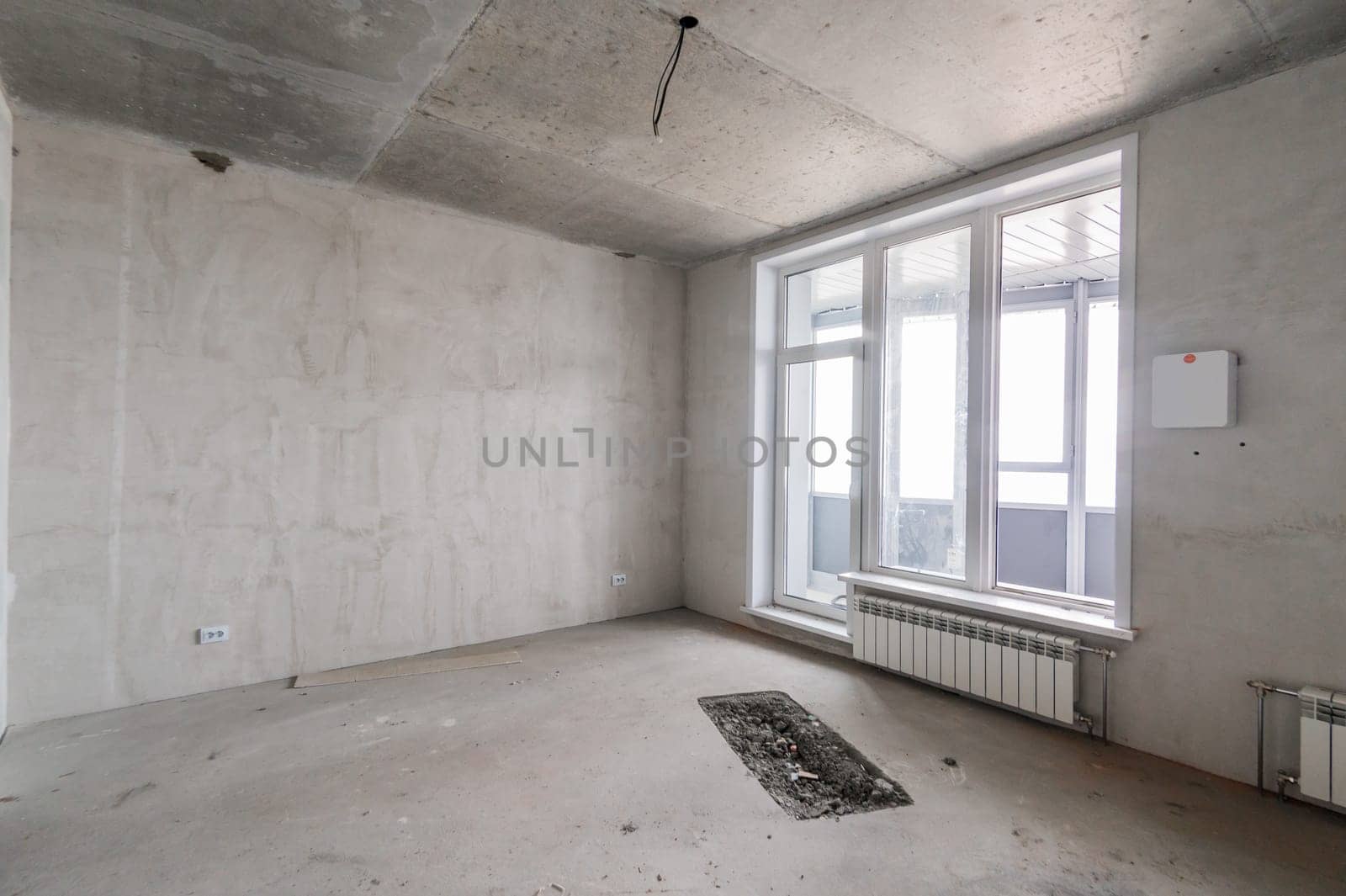 Russia, Moscow- July 16, 2019: interior room. rough repair for self-finishing. interior decoration, bare walls of the room, stage of construction