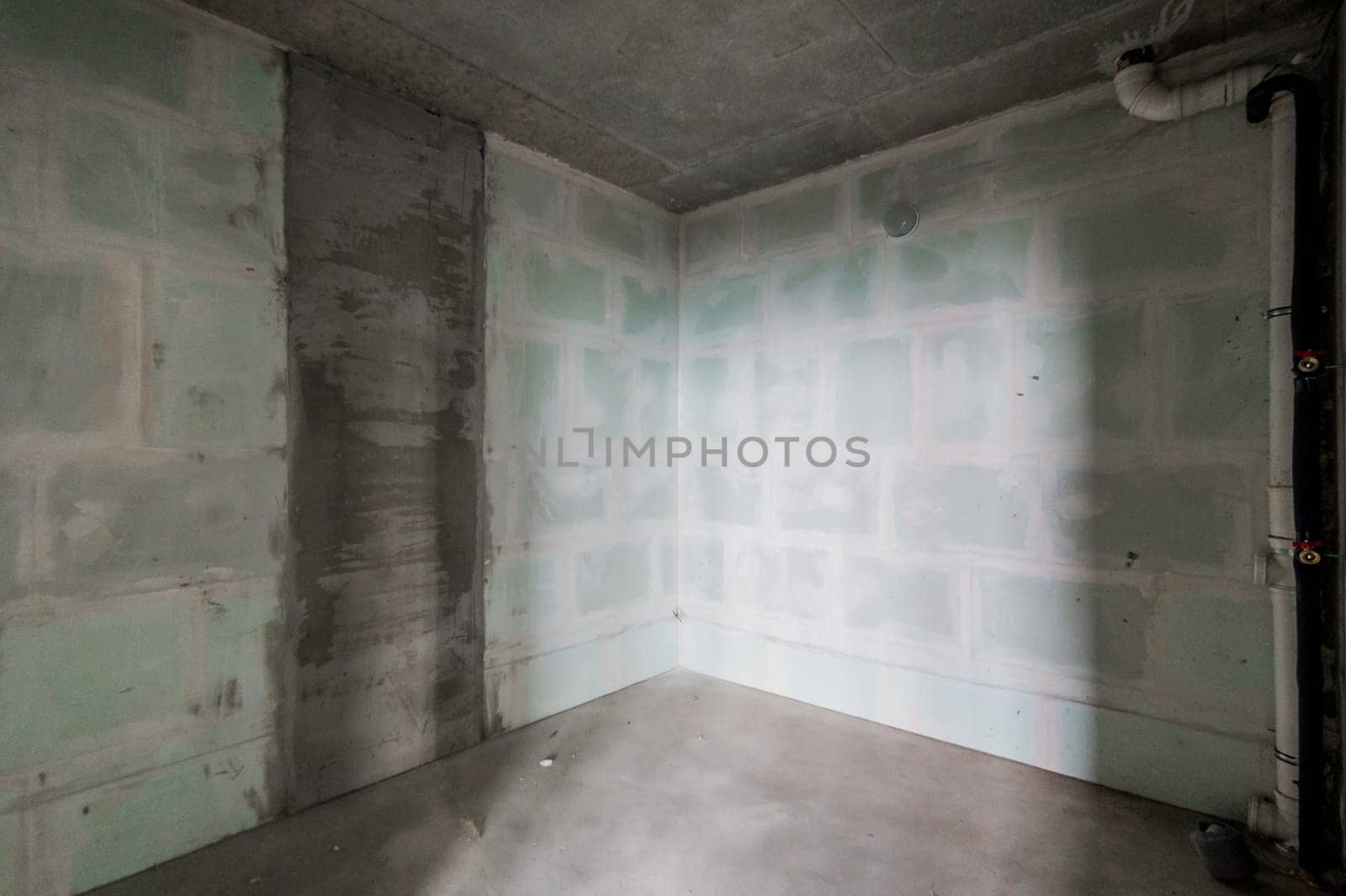 Russia, Moscow- July 16, 2019: interior room. rough repair for self-finishing. interior decoration, bare walls of the room, stage of construction