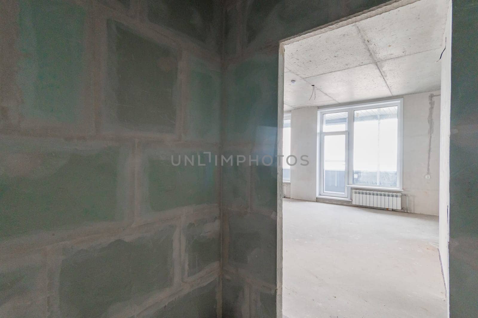 Russia, Moscow- July 16, 2019: interior room. rough repair for self-finishing. interior decoration, bare walls of the room, stage of construction