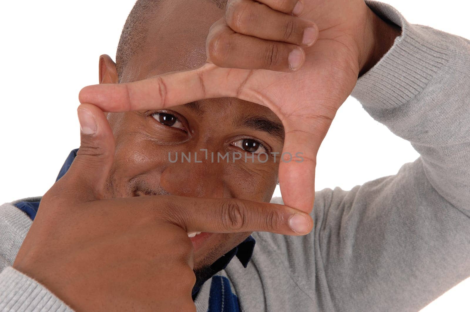 A young African American man signing a square foe taking an picture.with his hands, isolated for white background.