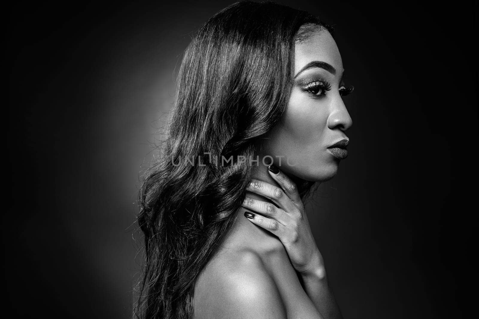 Face of an young black beauty in black and white