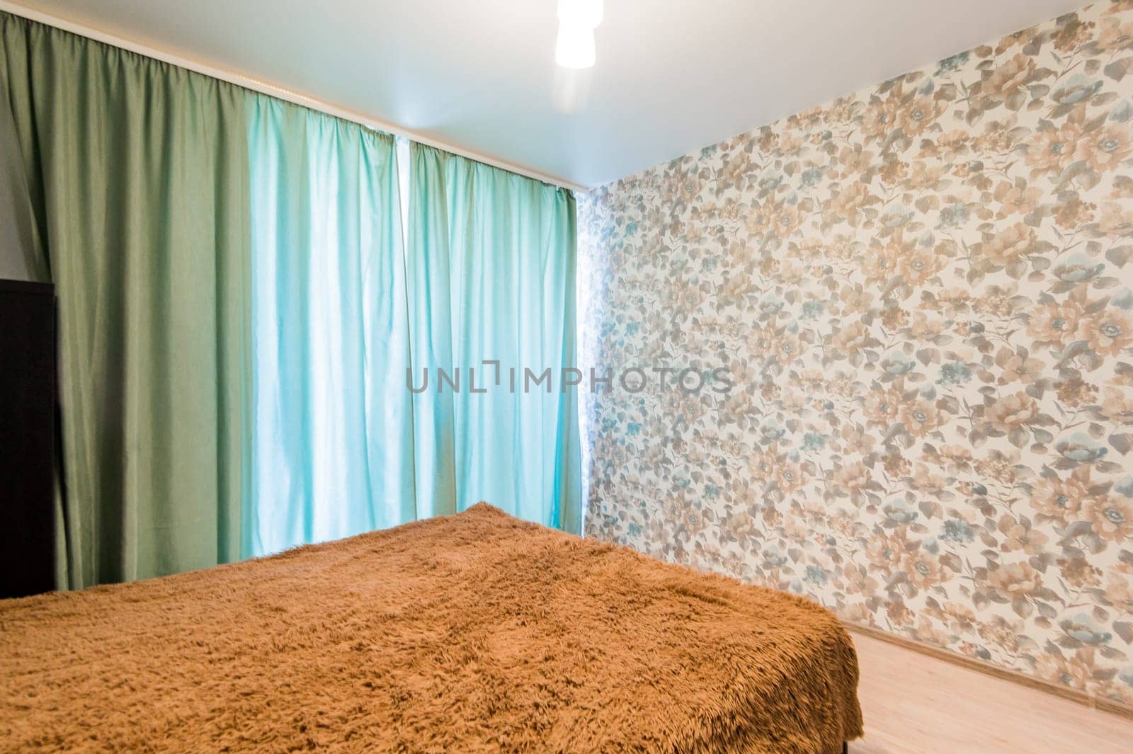 Russia, Moscow- July 08, 2019: interior room apartment. standard repair decoration in hostel. bedroom with bed