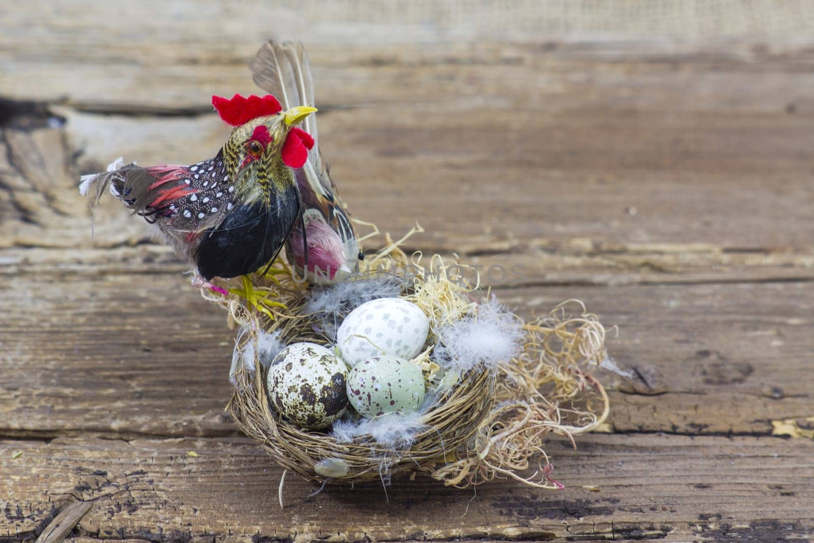 Easter decoration -  eggs in nest and birds