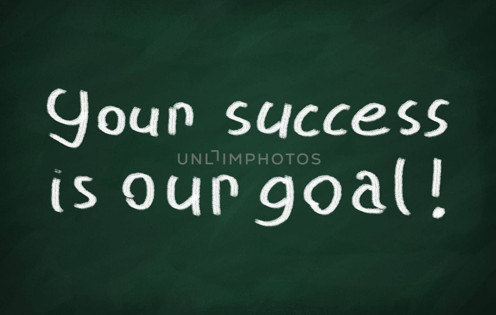 On the blackboard with chalk write Your success is our goal!