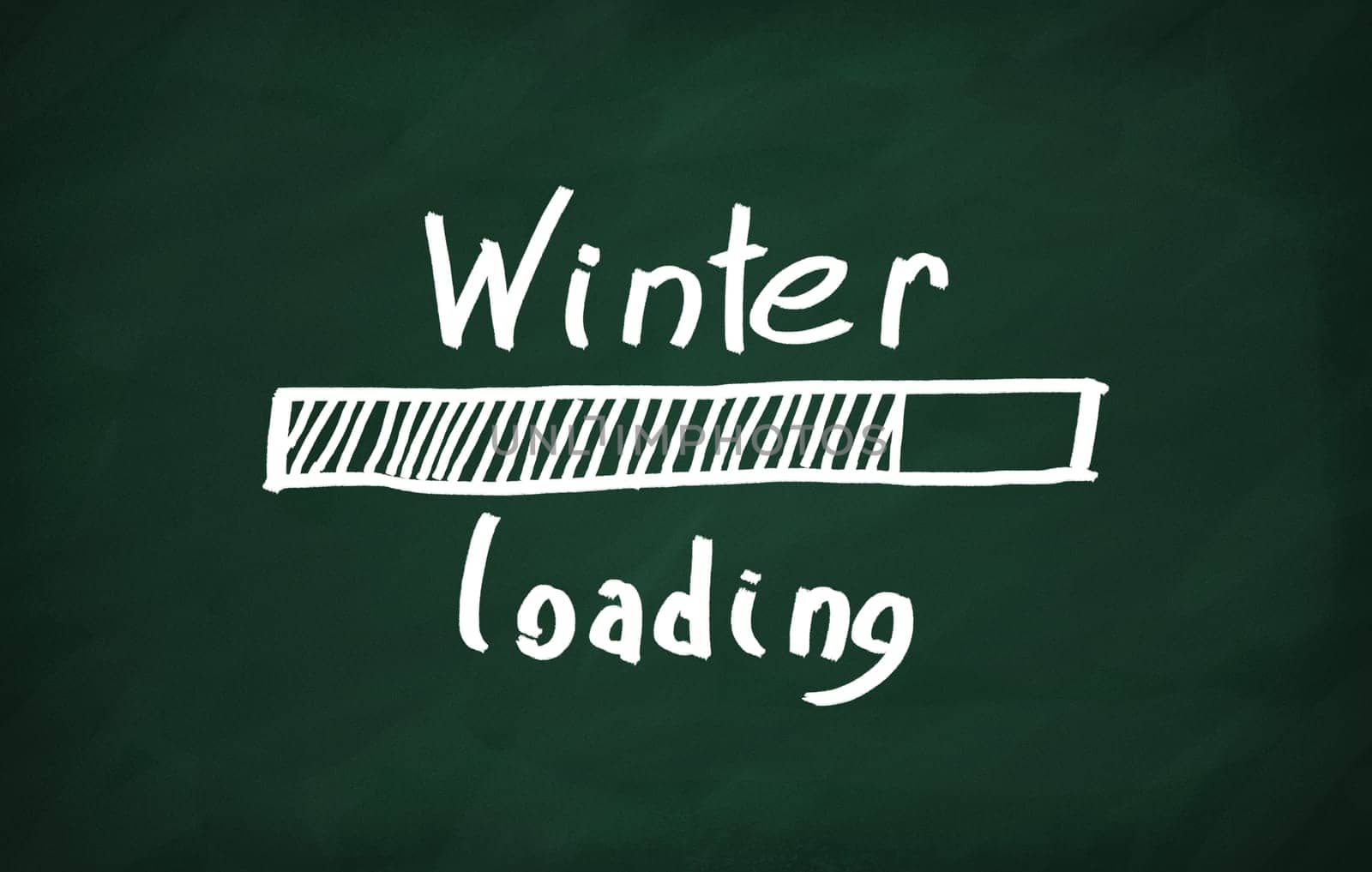 On the blackboard with chalk write Winter laoding