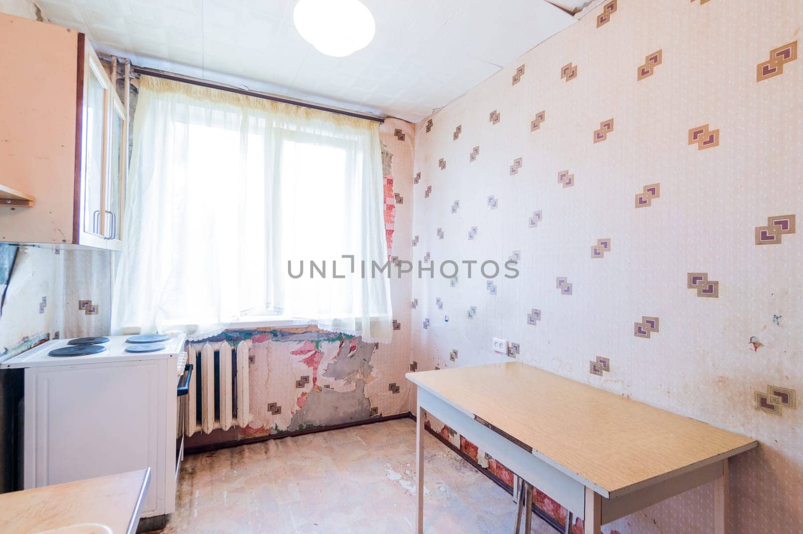 Russia, Moscow- July 23, 2019: interior room apartment. standard repair decoration in hostel. kitchen and dining room
