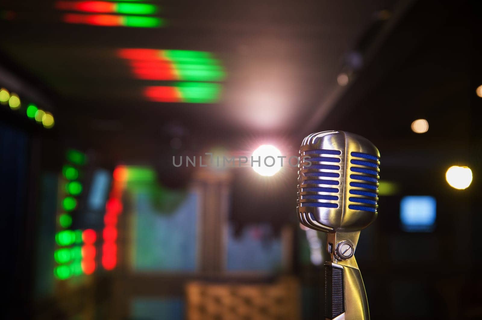 Close-up of retro microphone at concert