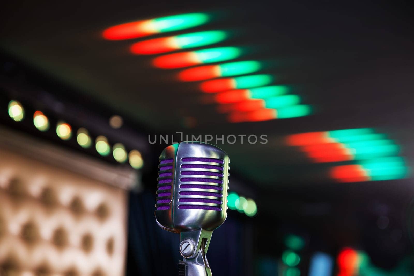 Close-up of retro microphone at concert