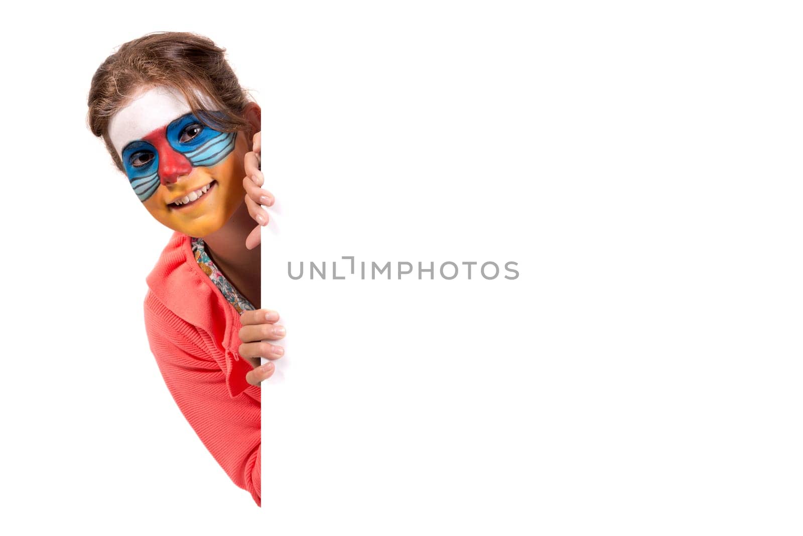 Girl with animal face-paint over a white board, isolated in white