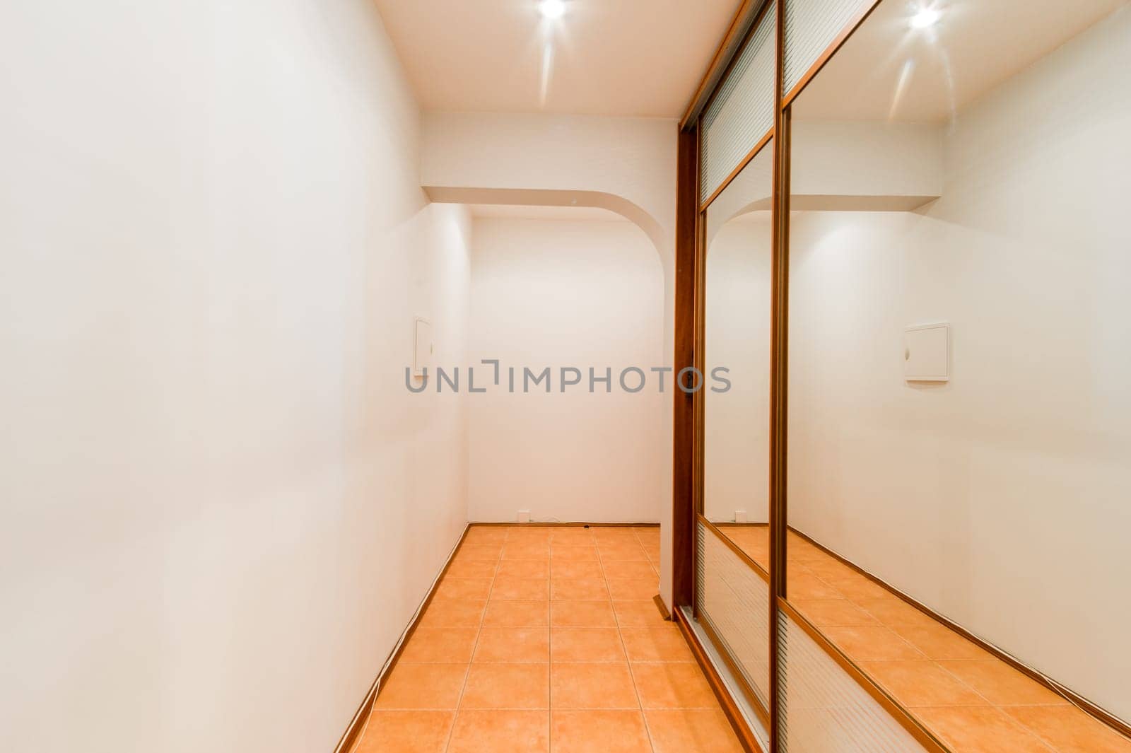 Russia, Moscow- August 01, 2019: interior room apartment. standard repair decoration in hostel. corridor, hallway, doors and mirrors