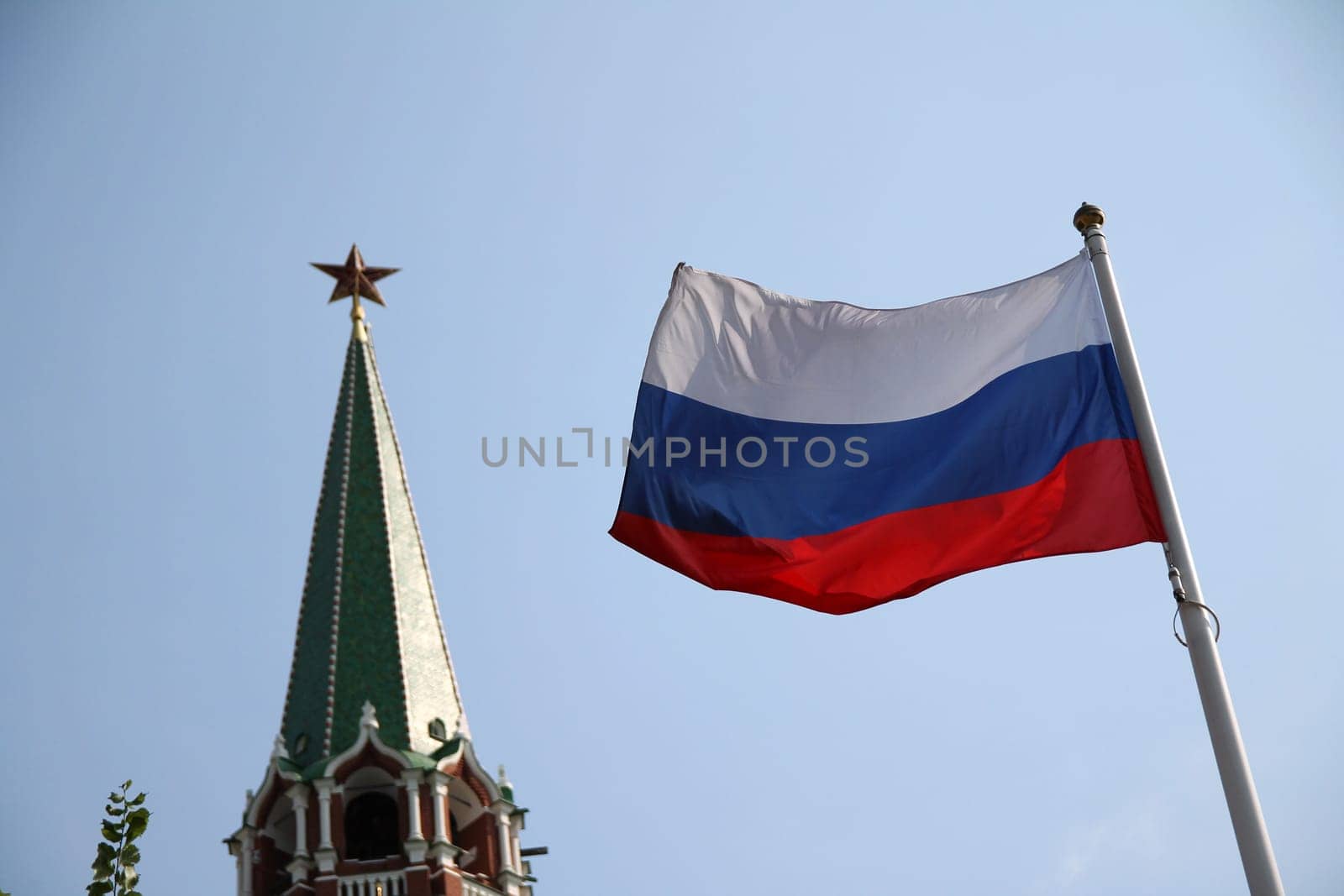 The Russian flag with the Kremlin on the back