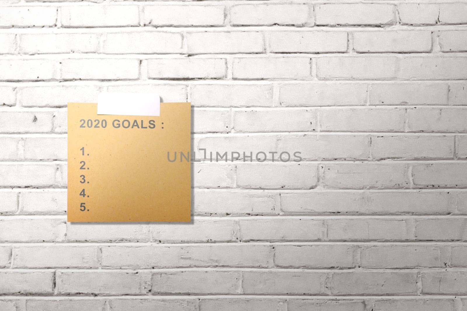 Empty list for 2020 goals in the paper stuck on the wall. Goals of 2020. Happy New Year 2020