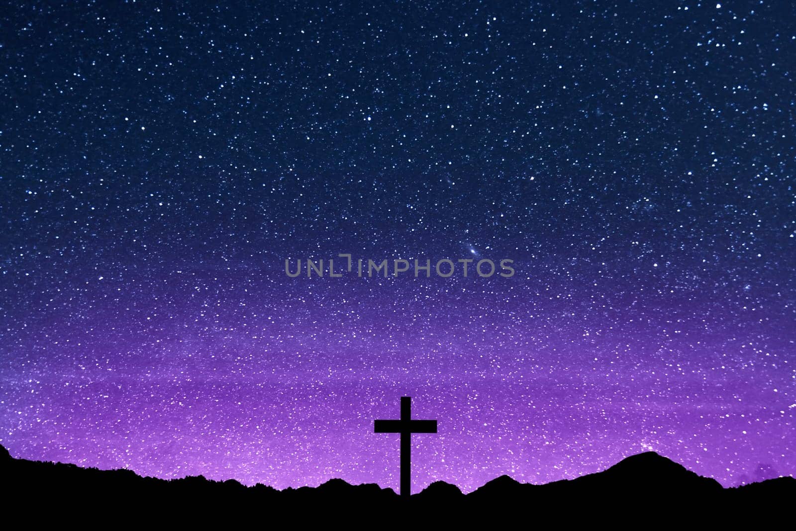 Christian Cross on the field with a night scene background
