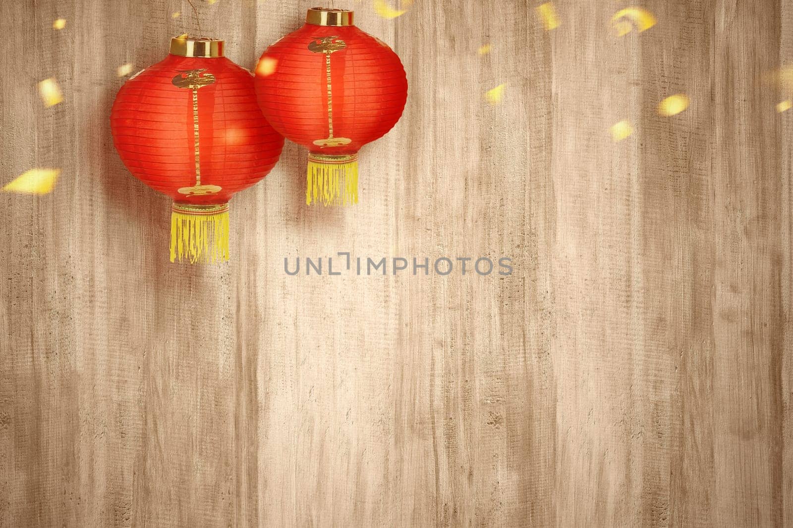 Chinese lanterns hanging with wooden wall background