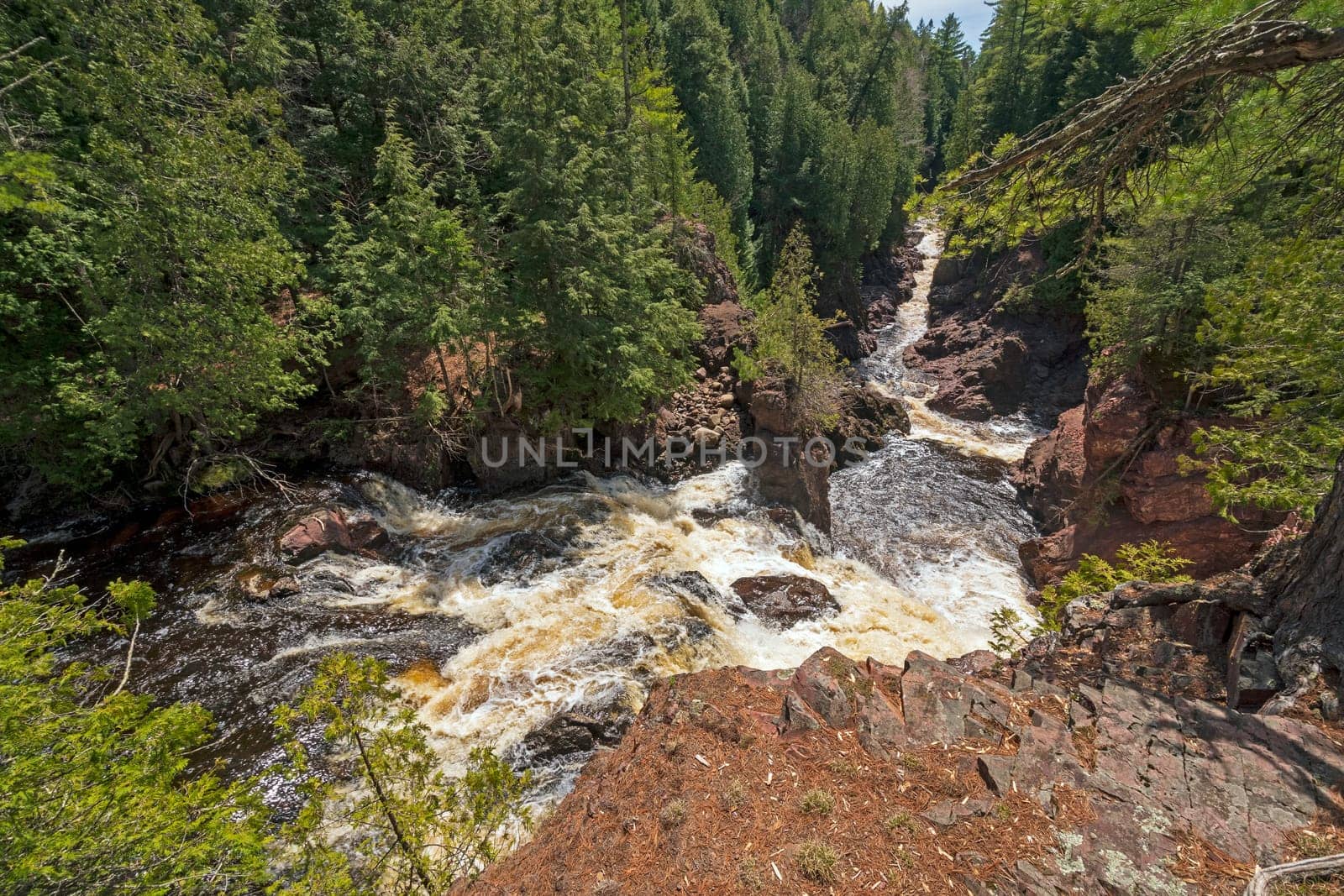 Water Rushing Down a Narrow Gorge in Copper Falls State Park in Wisconsin