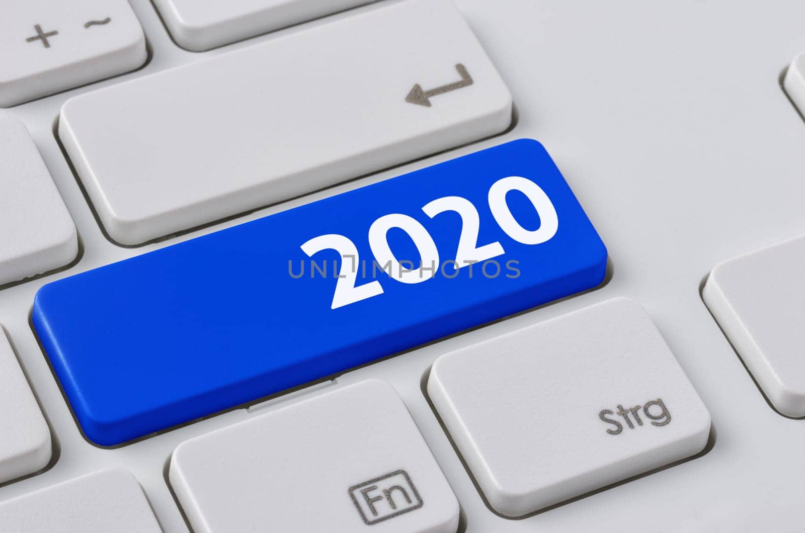 A keyboard with a blue button - 2020