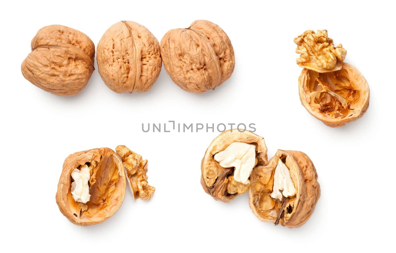 Walnuts isolated on white background. Top view, flat lay