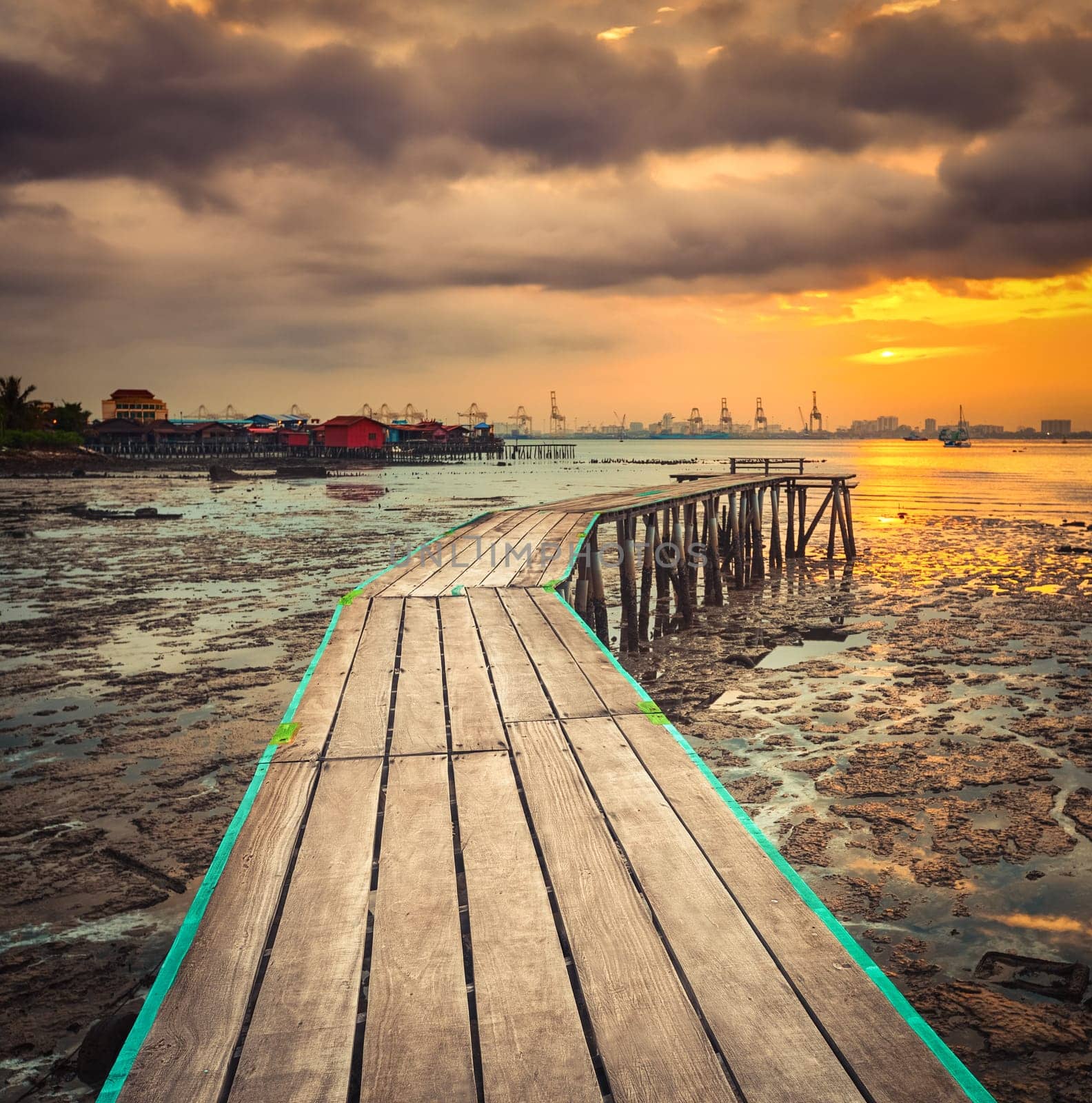Beautiful view of sunrise at Penang. Yeoh jetty on the foreground.  Malaysia