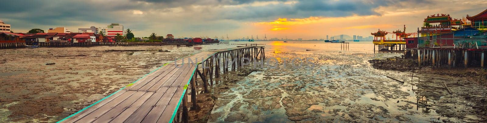 Beautiful view of sunrise at Penang. Yeoh jetty on the foreground.  Malaysia. Panorama