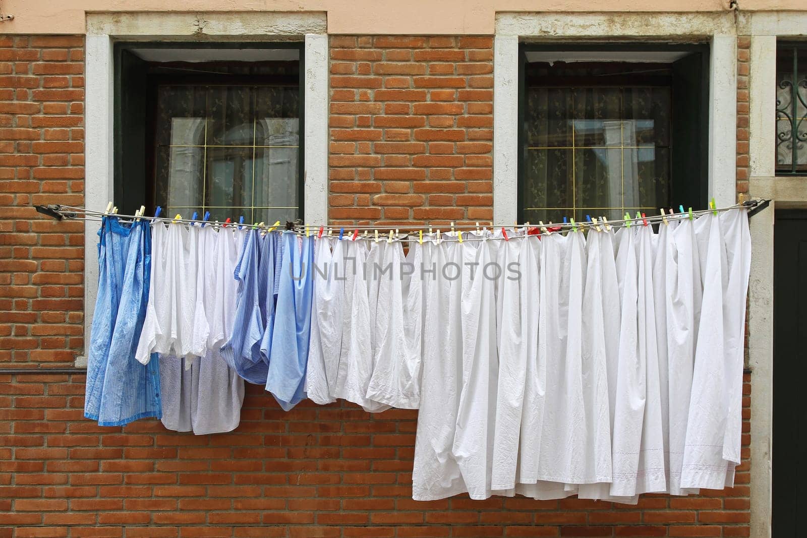 Fresh and clean clothes at window line