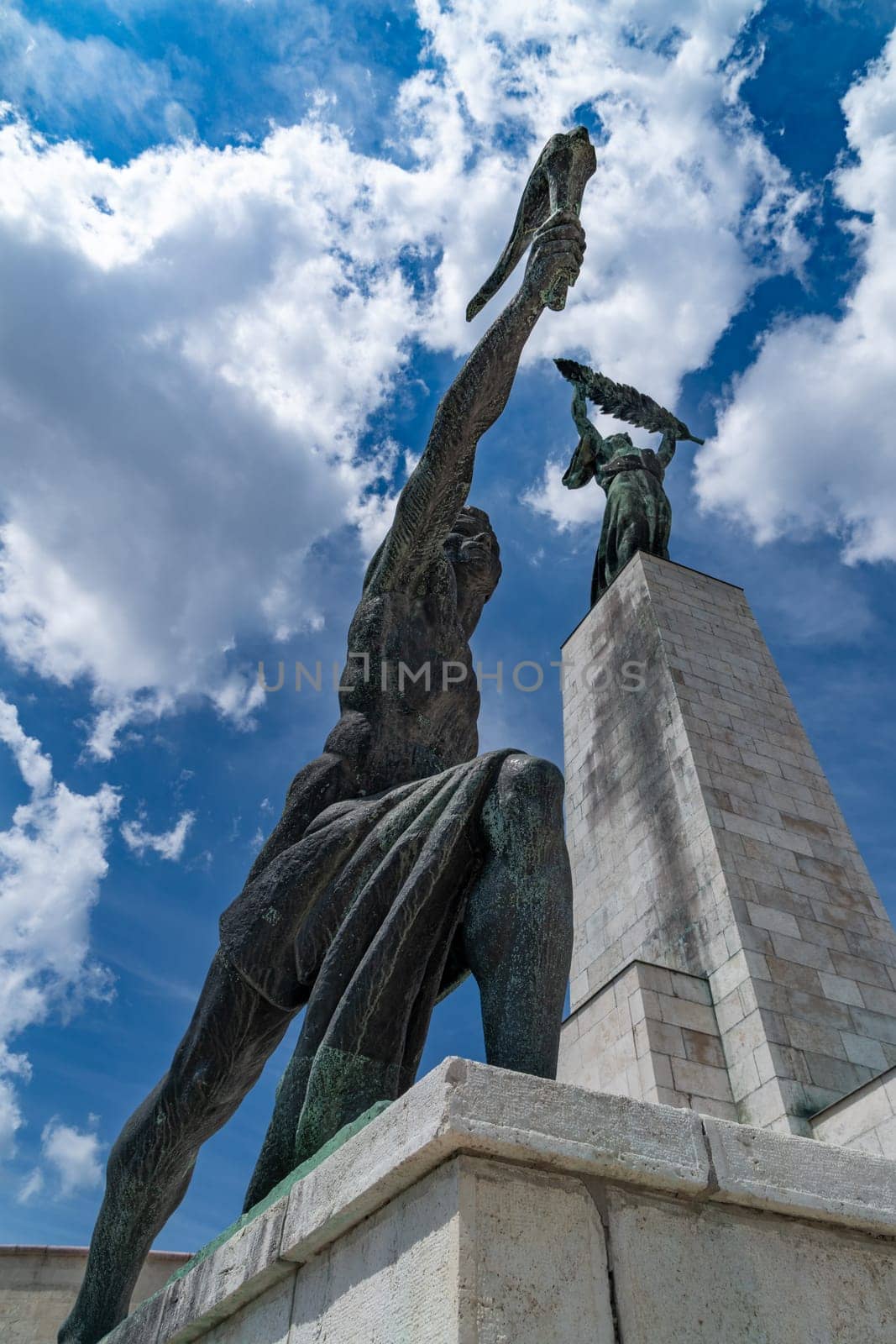 Budapest, Hunghery - July 05, 2019: At the top of the hill Géllert, upper part of the citadel, there is the monument to the liberation. Details of the statues taken from below. It was erected in 1947. Budapest, Hunghery.