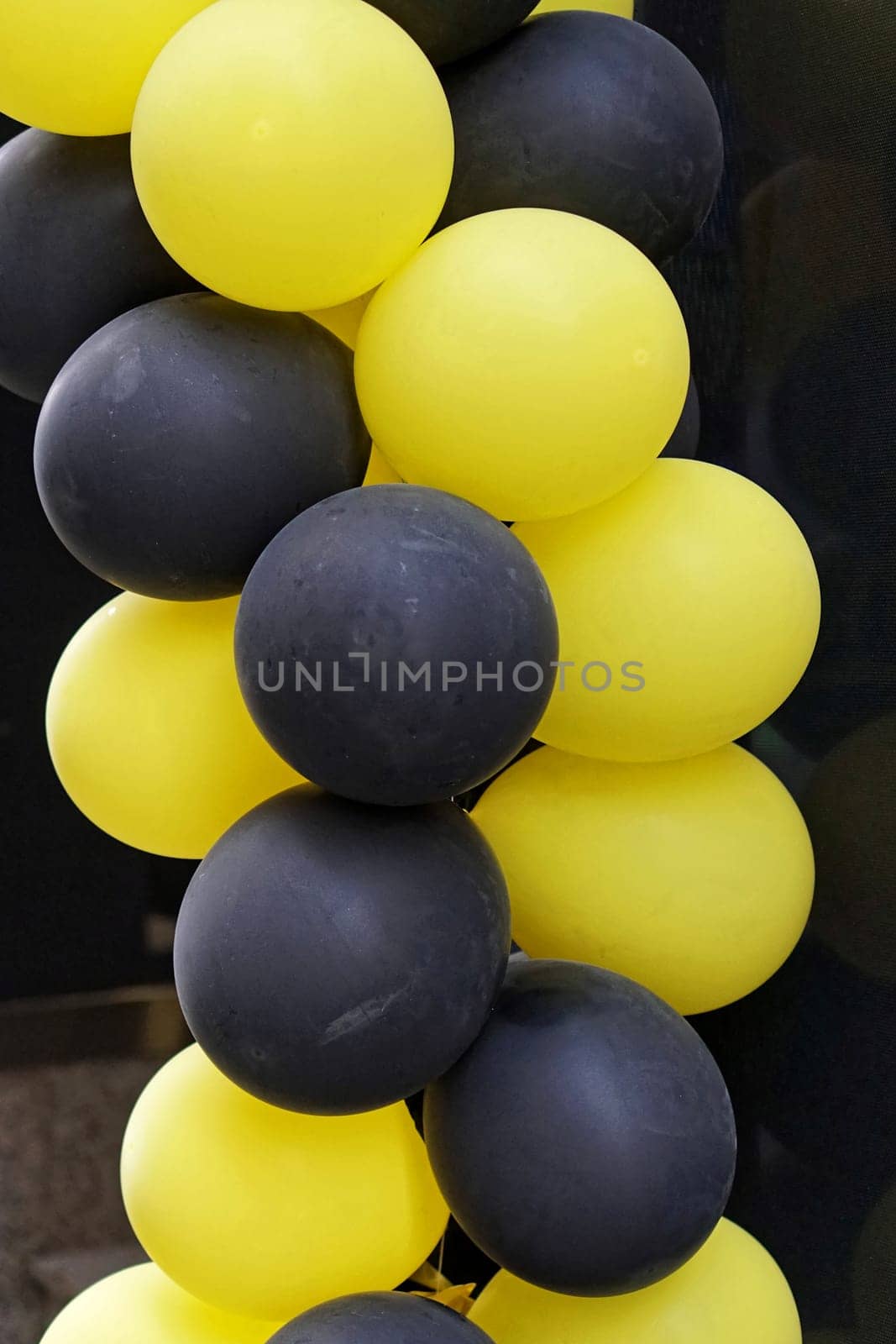Yellow and black balloons for party decor