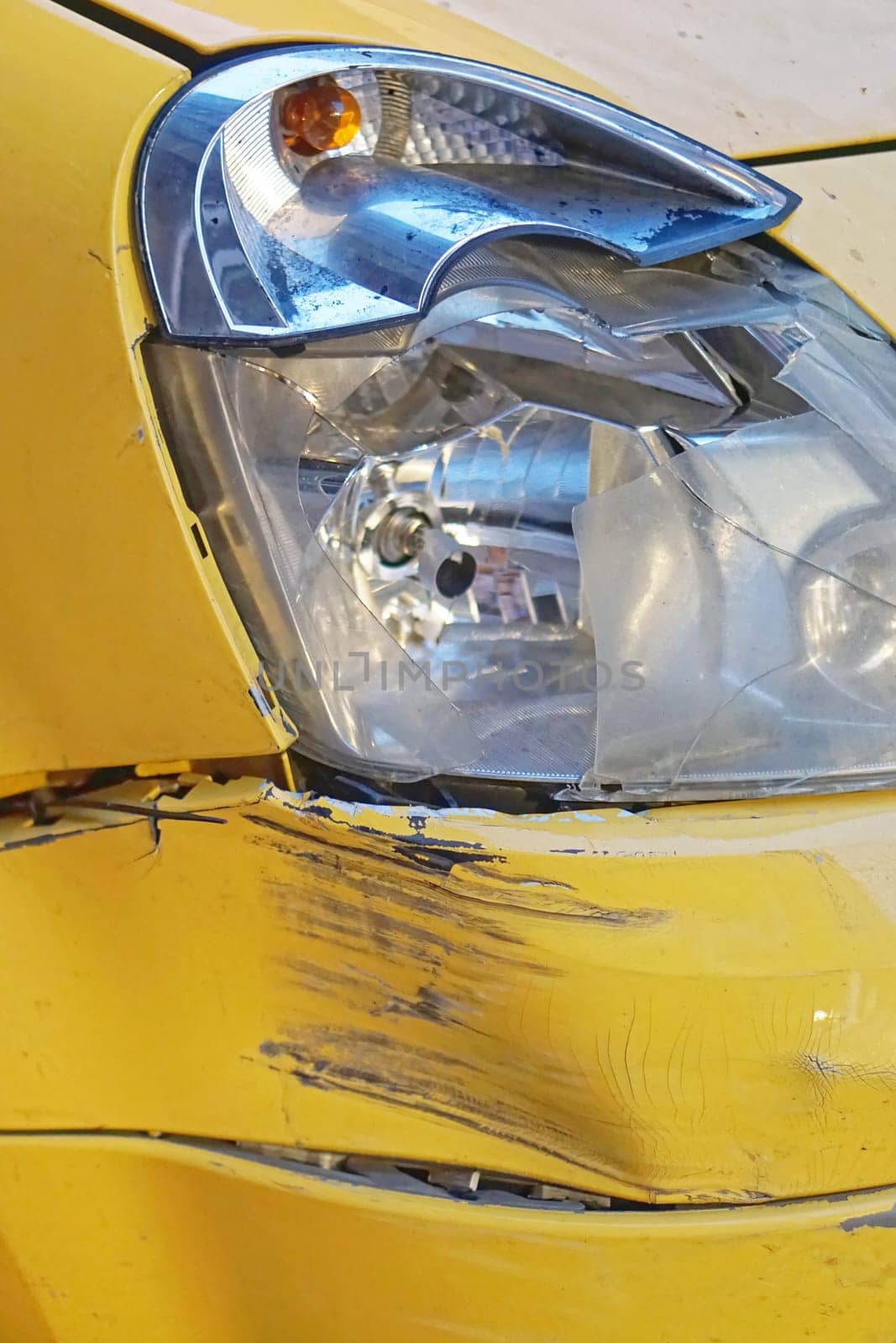 Damaged car front headlight traffic accident problem