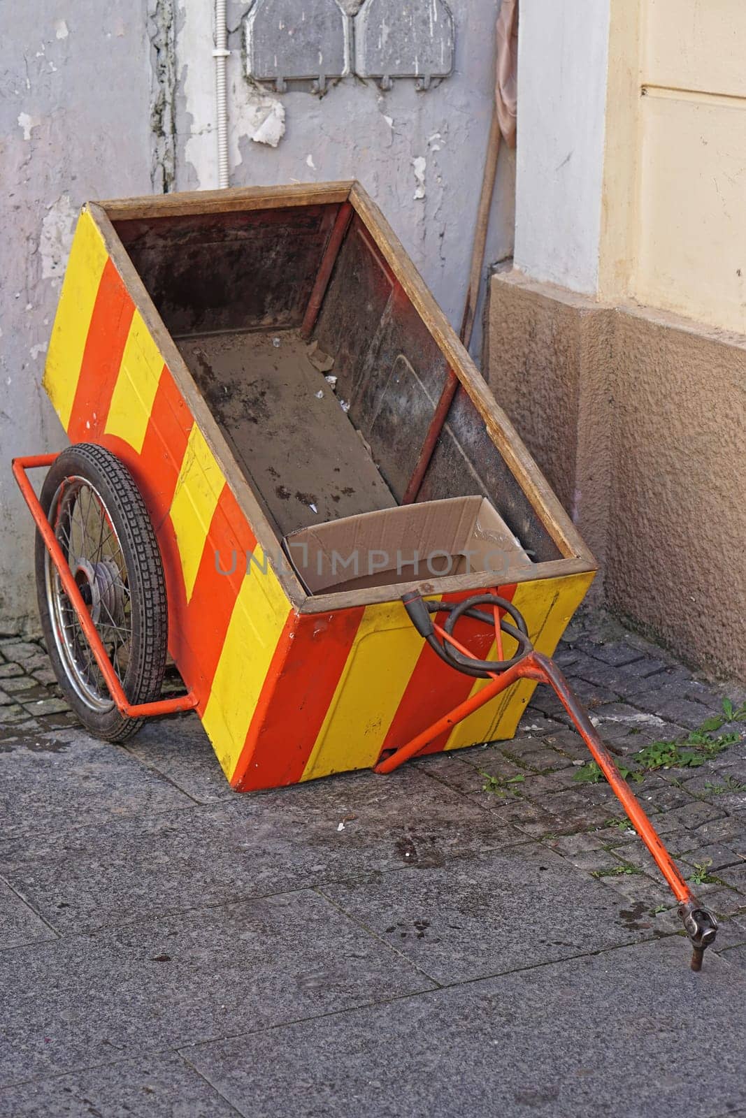 Orange and yellow bicycle cargo transport trailer