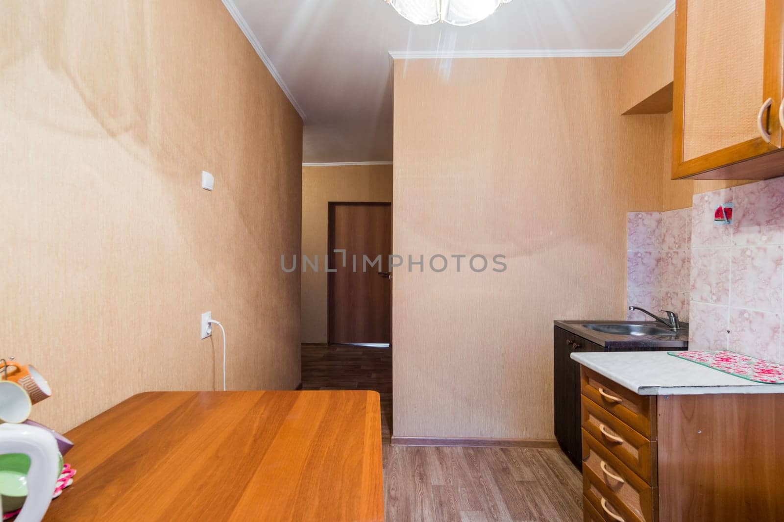 Russia, Omsk- August 02, 2019: interior room apartment. standard repair decoration in hostel. kitchen, dining area