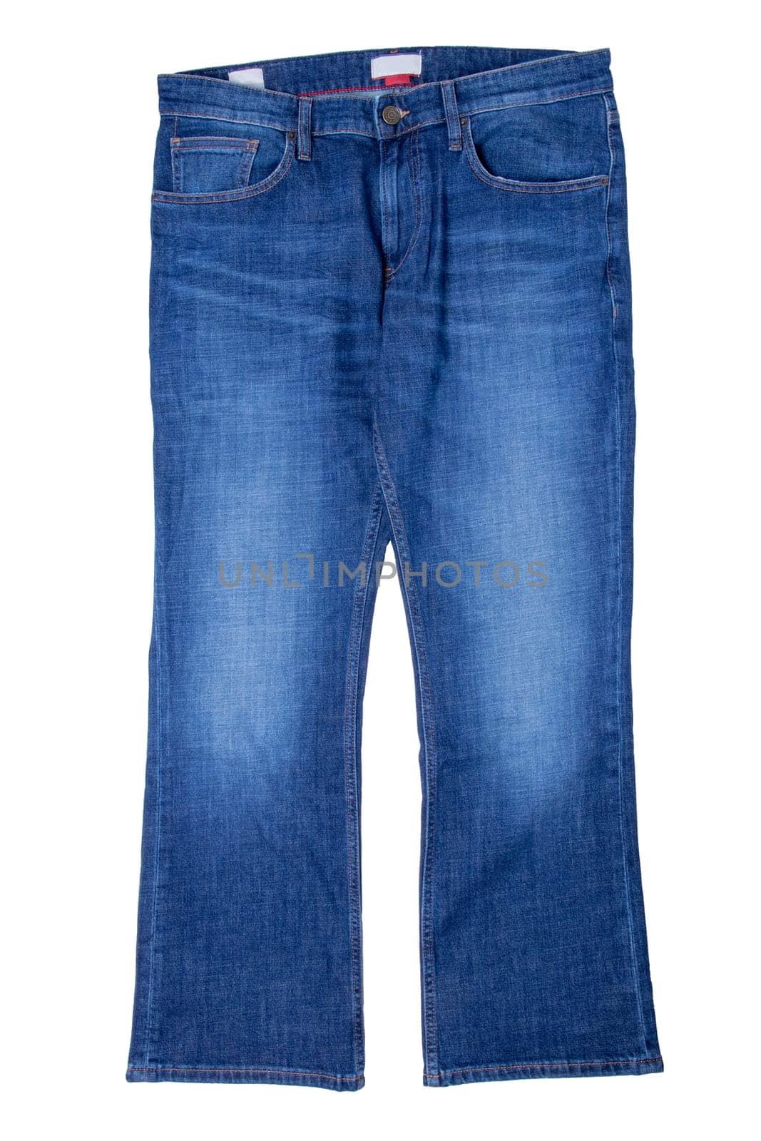 Jeans fashion. Closeup of blue jeans trousers isolated on white background. Fashionable denim pants for man.