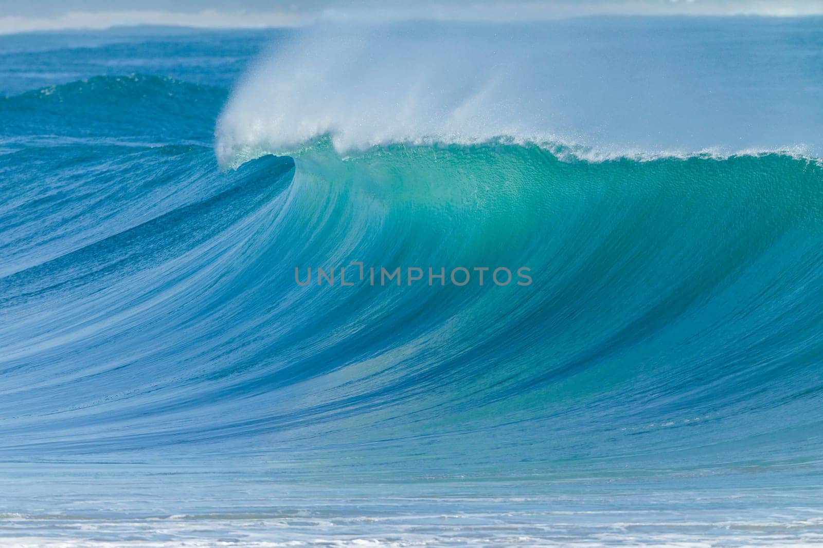 Ocean Wave crashing breaking swells cresting  closeup hollow scenic sea power energy of nature