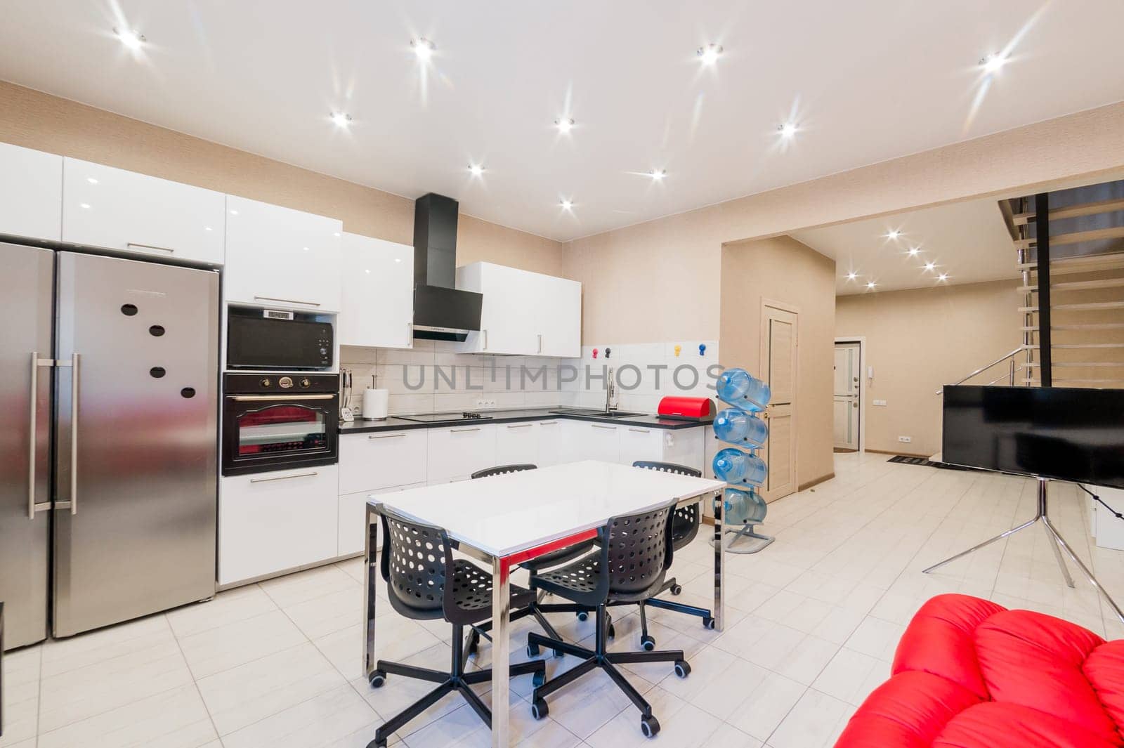 Russia, Moscow- August 05, 2019: interior room apartment modern bright cozy atmosphere. general cleaning, home decoration, preparation of the house for sale. modern kitchen, dining area