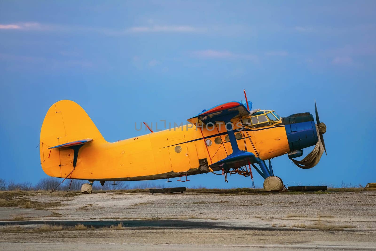 An Old One-engine Airplane on the Airfield